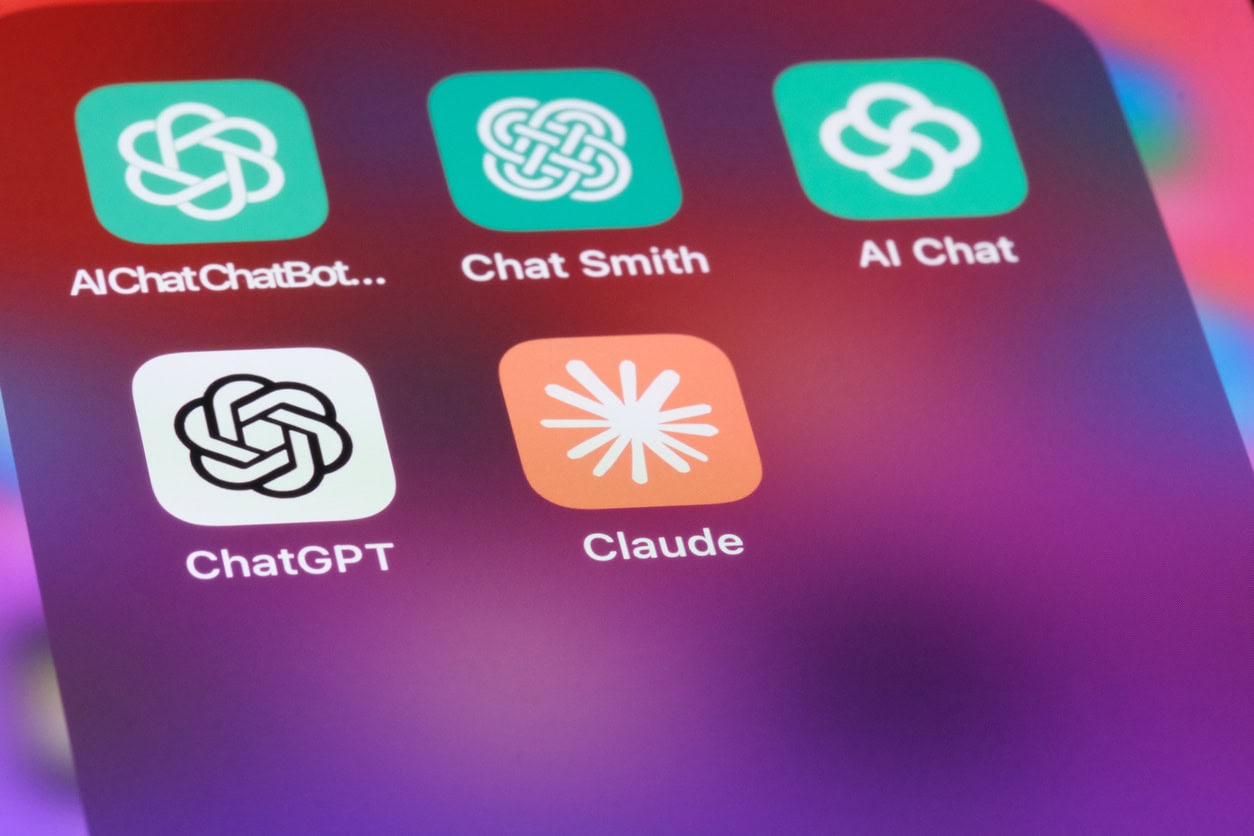 A close up of a phone screen that includes ChatGPT and Claude as apps.